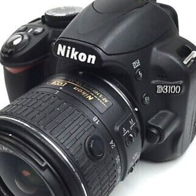 Nikon D3100 with 18-55mm...